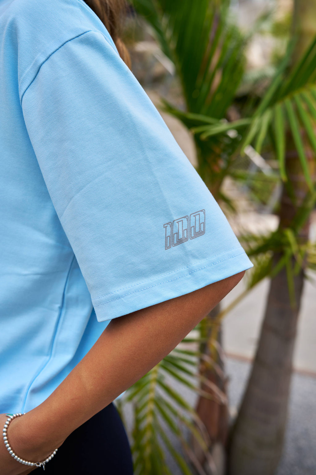 ONEHNDRD Risk Takers oversized tee sky blue unisex