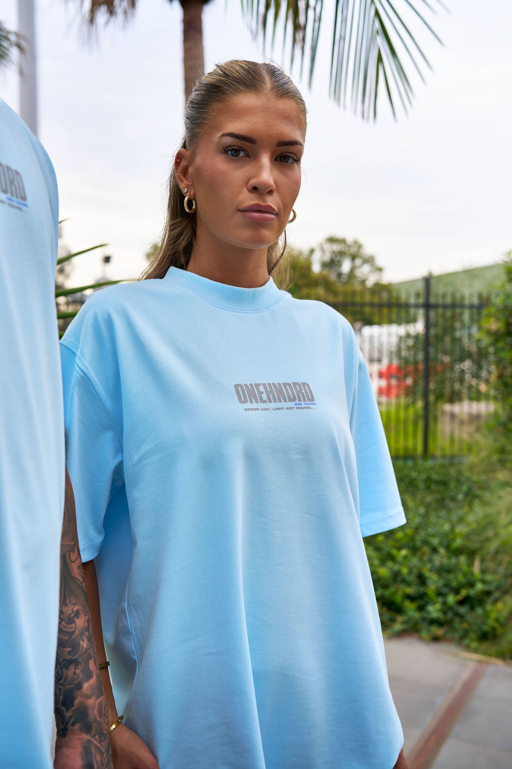 ONEHNDRD Risk Takers oversized tee sky blue unisex