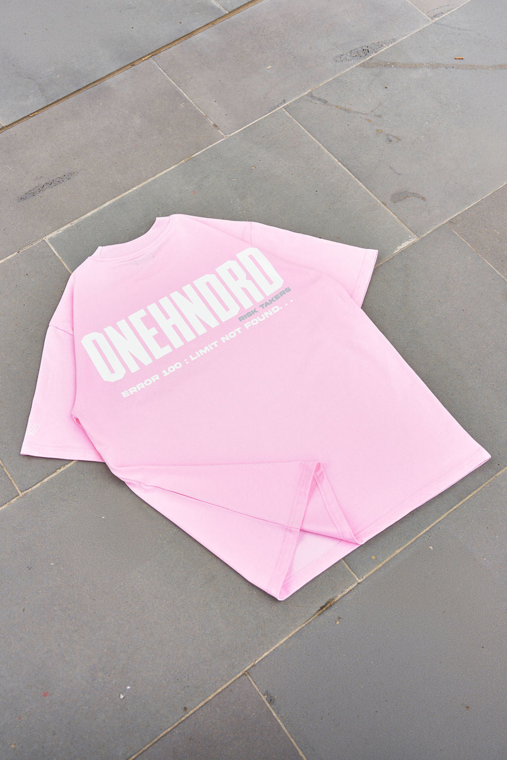 ONEHNDRD Risk Takers oversized tee dust pink unisex