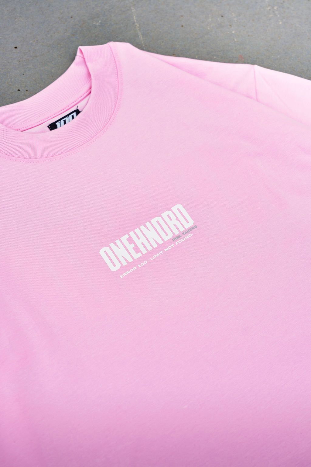 ONEHNDRD Risk Takers oversized tee dust pink unisex