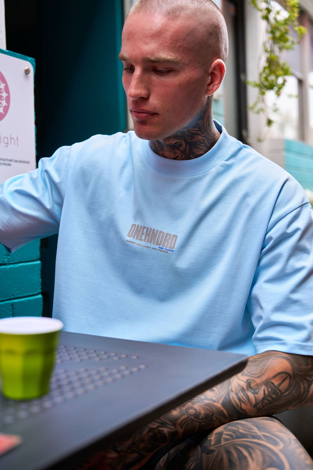 ONEHNDRD Risk Takers oversized tee sky blue unisex